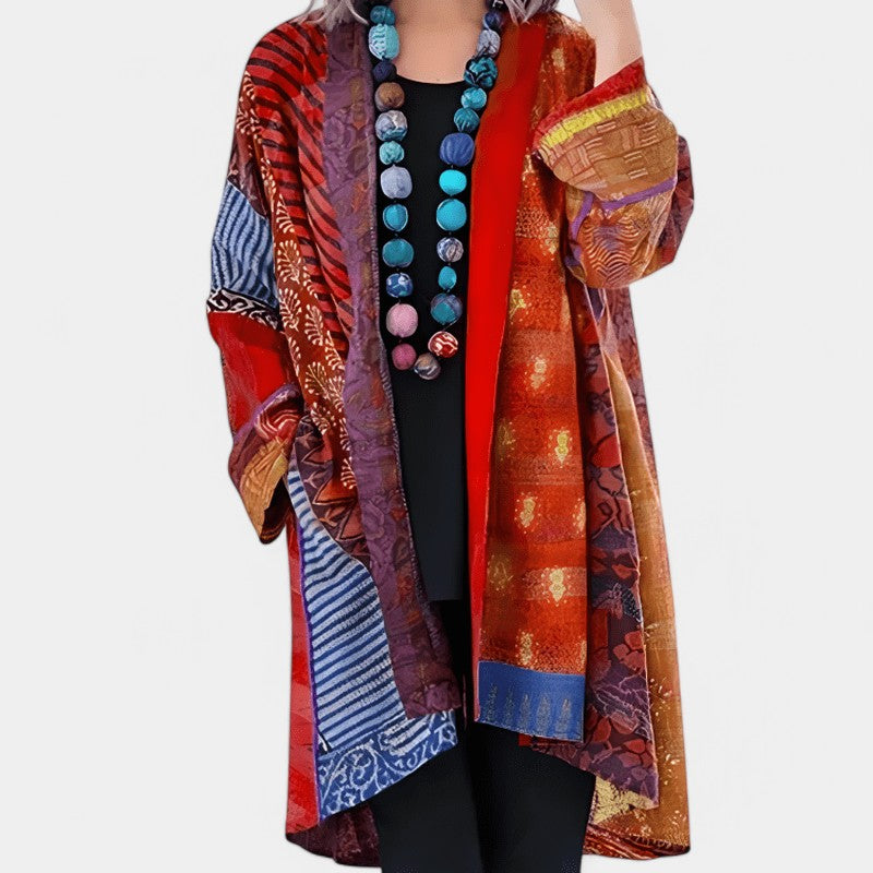 Gleame.-Gleame cape - Elegante open design cape