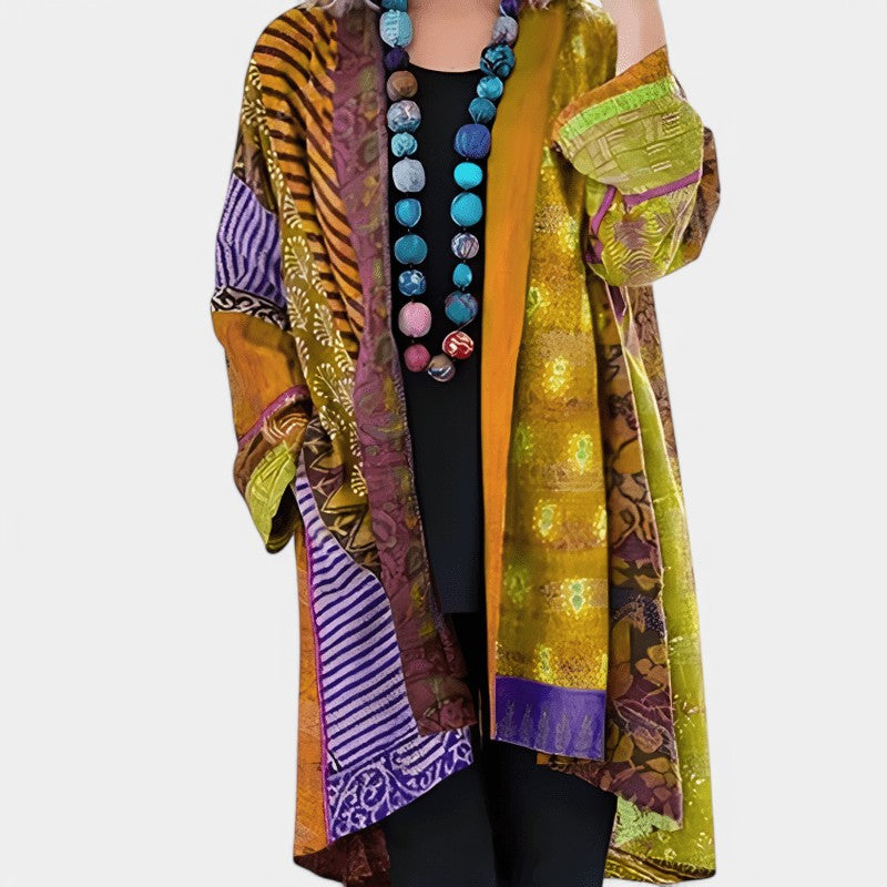 Gleame.-Gleame cape - Elegante open design cape