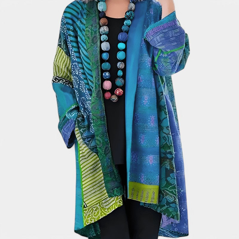 Gleame.-Gleame cape - Elegante open design cape