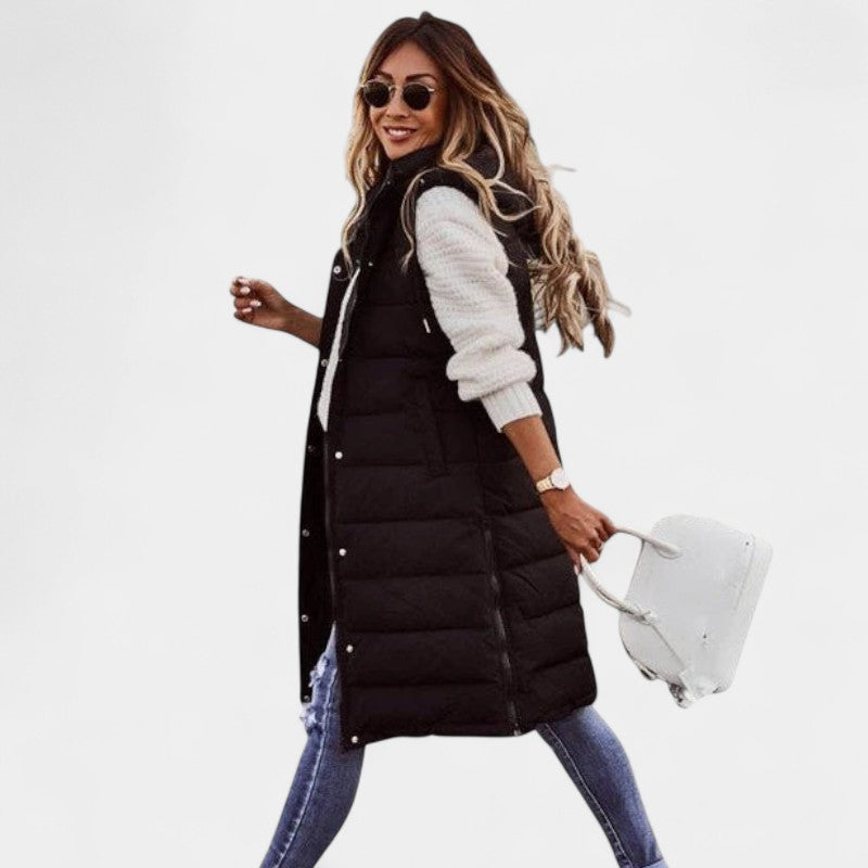 Gleame.-Jassen-Gleame Damesbodywarmer - Lange mouwloze damesbodywarmer met capuchon