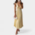 Gleame.-Jurken & Jumpsuits-Gleame Jurk - Maxi jurk met V-hals, plissérok en uitsnijdingen