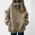 Gleame.-Truien & Vesten-Gleame Trui - Oversized wollen trui met hoge hals en opgerolde mouwen