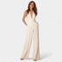 Gleame.-Jumpsuits-Gleame Jumpsuit - Lange jumpsuit met wijde pijpen en halternek