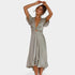 Gleame.-Jurken & Jumpsuits-Gleame Jurk - Elegante jurk met korte puffmouwen en V-hals