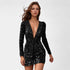 Gleame.-Jurken & Jumpsuits-Gleame Jurk - V-hals lange mouwen glanzende jurk
