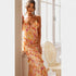 Gleame.-Jurken & Jumpsuits-Gleame Jurk - V-hals ruffled backless jurk met bloemenprint