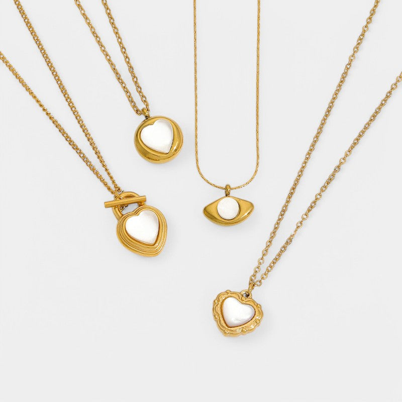 Gleame.-Sieraden-Gleame Ketting - 18k gouden titanium kattenoog hart hanger