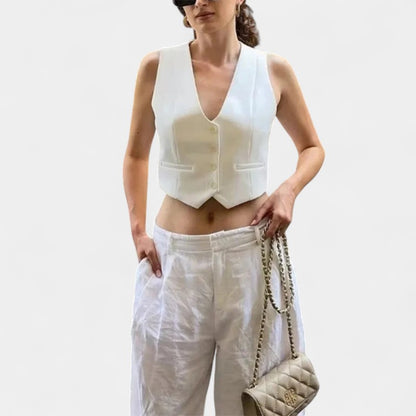 Gleame.-T-shirts &amp; hemden-Gleame Bijgesneden top - Zwarte en witte top met V-hals en mouwenloos