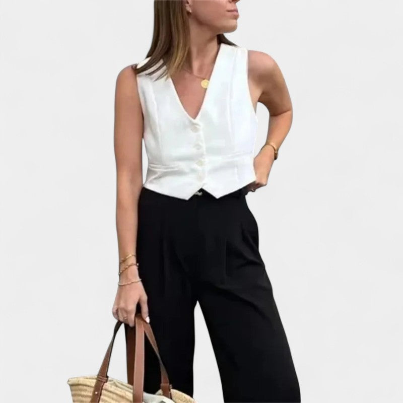 Gleame.-T-shirts &amp; hemden-Gleame Bijgesneden top - Zwarte en witte top met V-hals en mouwenloos